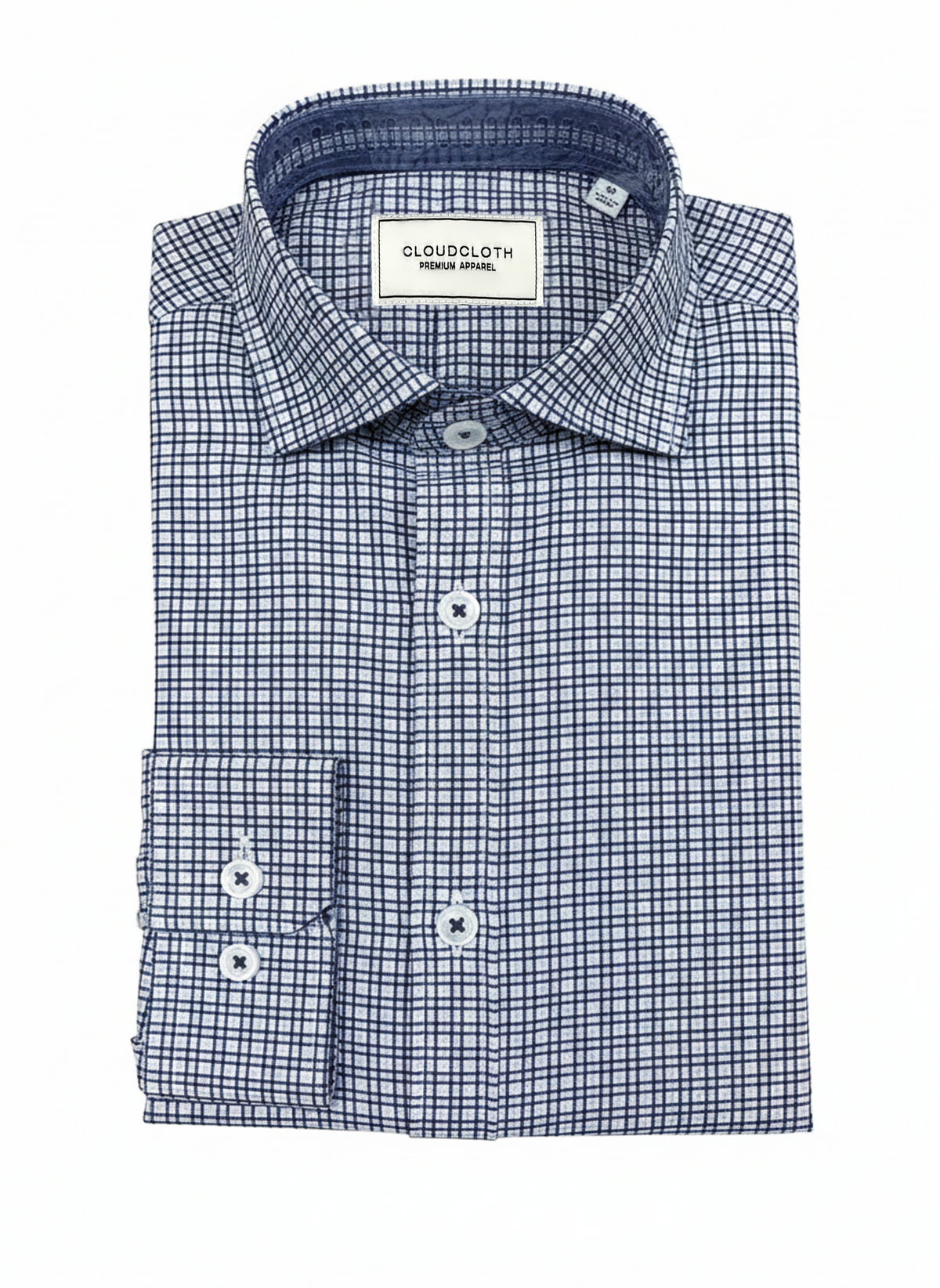 A folded men's dress shirt by Cloudcloth, featuring a blue and white micro-check pattern, a classic collar, and a button-down front.