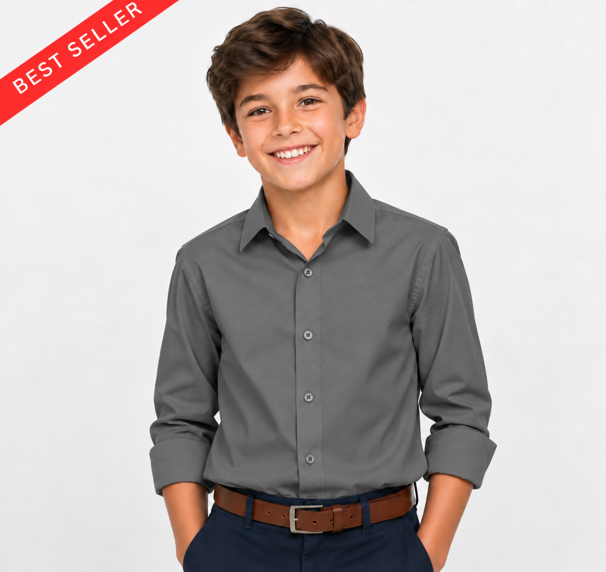 A smiling young boy wearing a dark gray long-sleeve button-down shirt, navy pants, and a brown belt, standing against a light gray background with a red 'BEST SELLER' banner in the top-left corner.