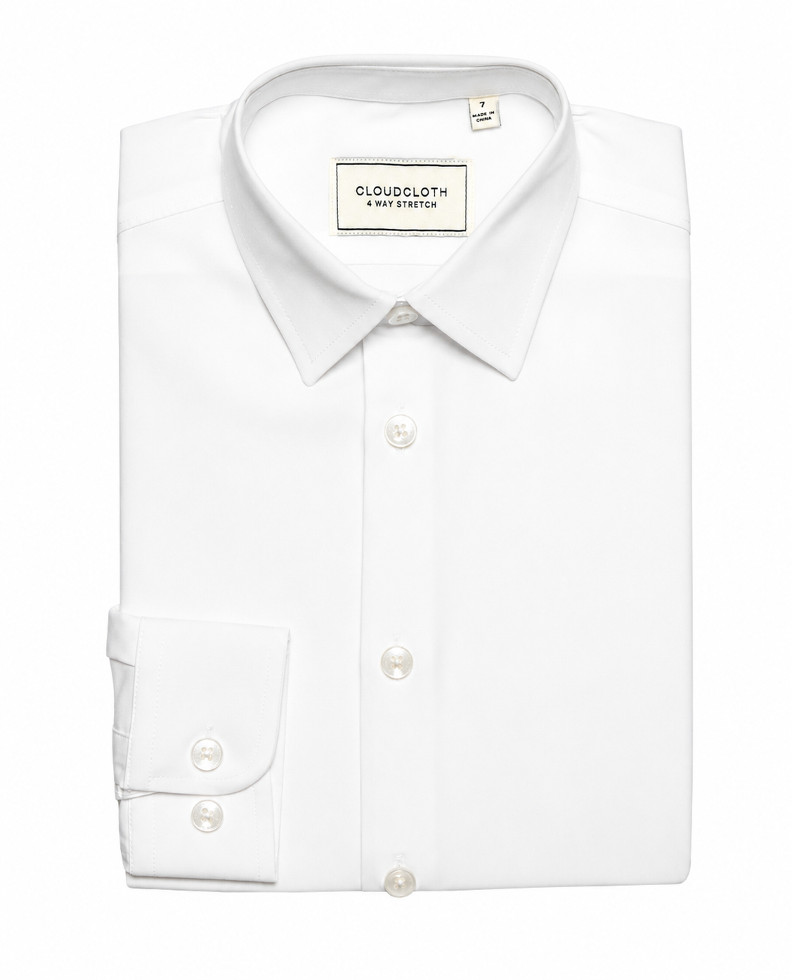 White dress shirt with collar tag on a white background