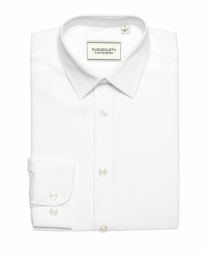 White dress shirt with collar tag on a white background