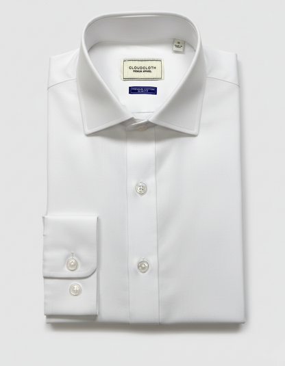 White dress shirt with a collar label on a light gray background