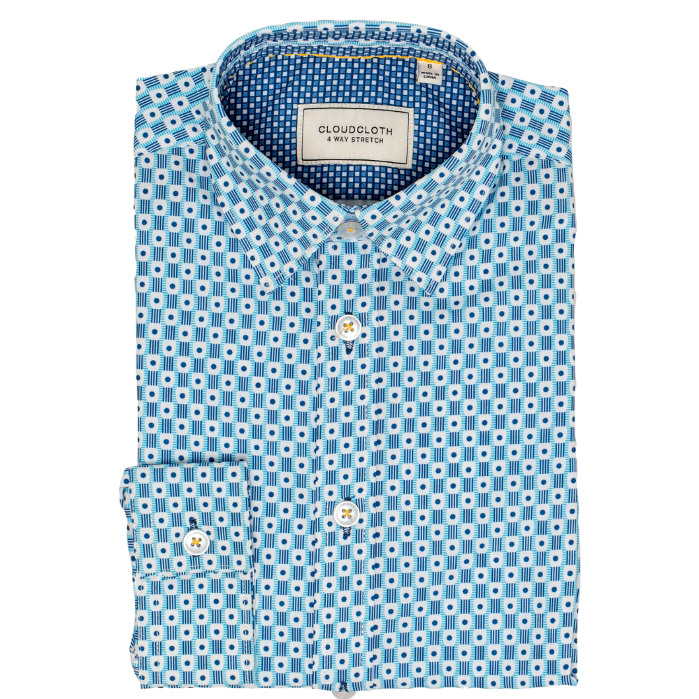 Folded blue and white patterned shirt with 'CloudCloth' label on a white background