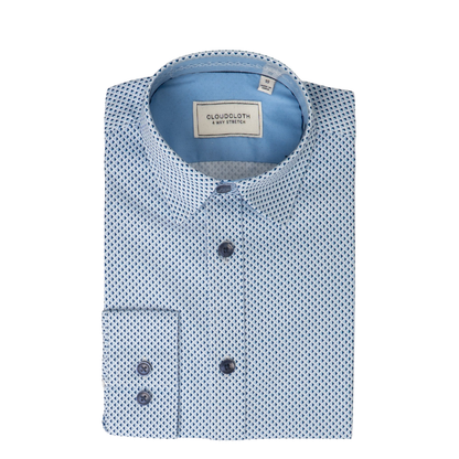 Folded light blue patterned shirt with a CloudCloth label on a white background