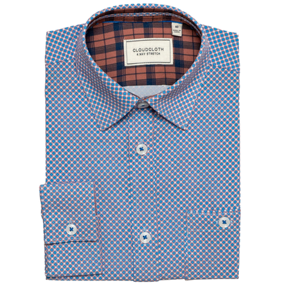 Folded blue checkered shirt with a visible brand label on a white background