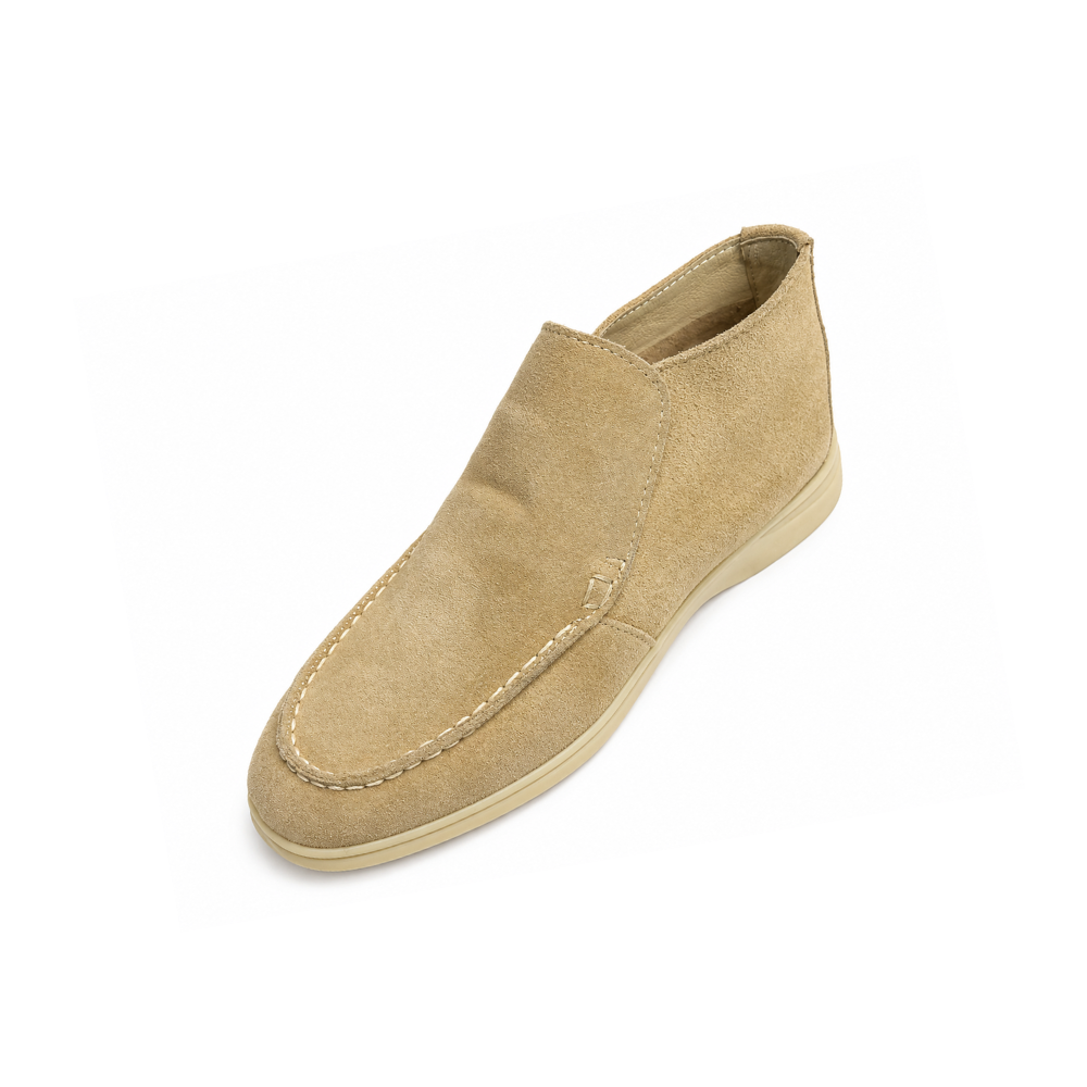 Beige slip-on shoe on a white background
