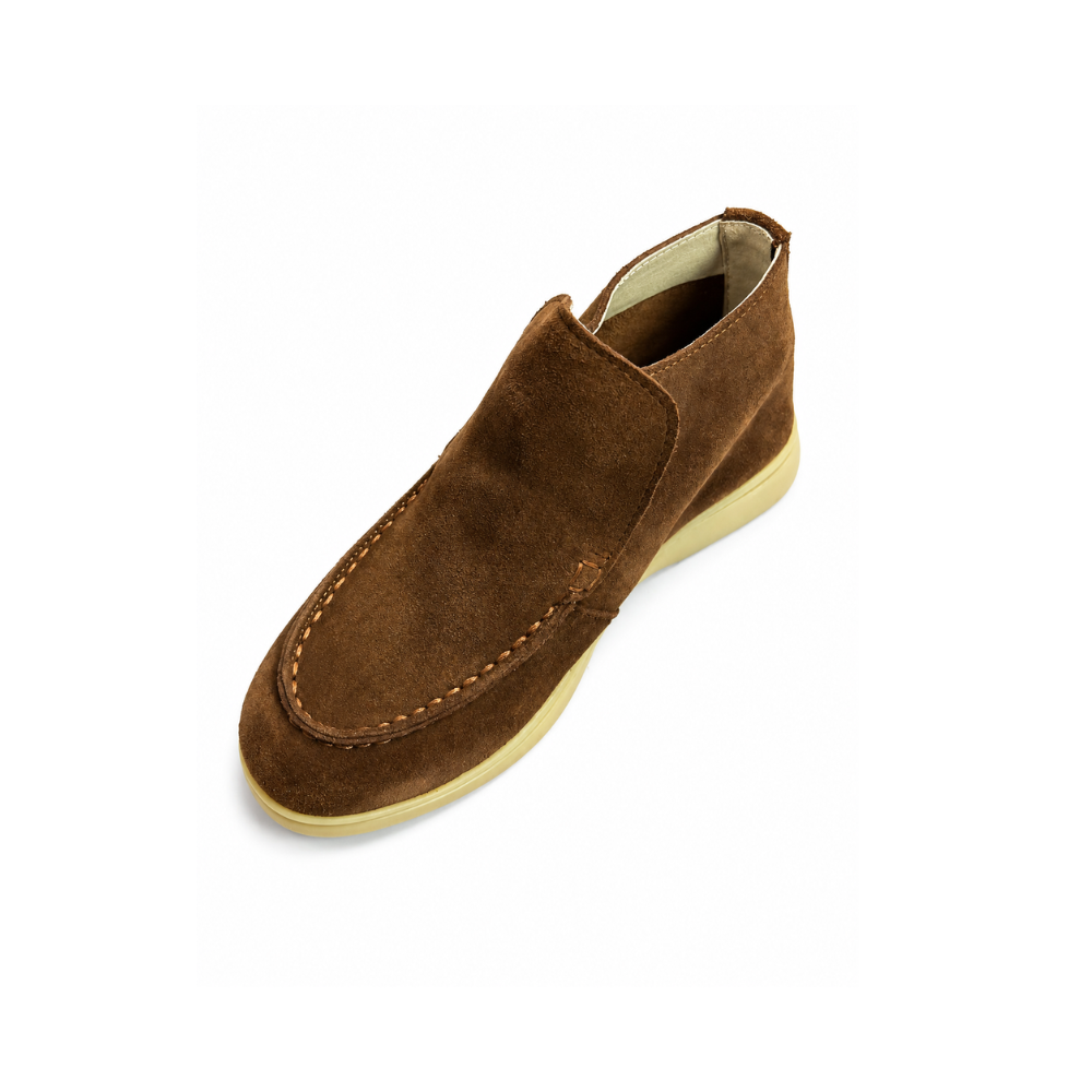 Brown suede loafer shoe on a white background