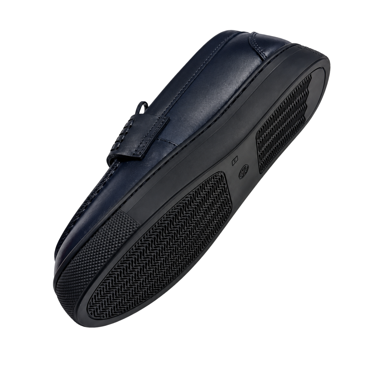A navy blue leather loafer shown from a high-angle perspective, displaying its textured black sole with a herringbone pattern and a small circular logo on the side.