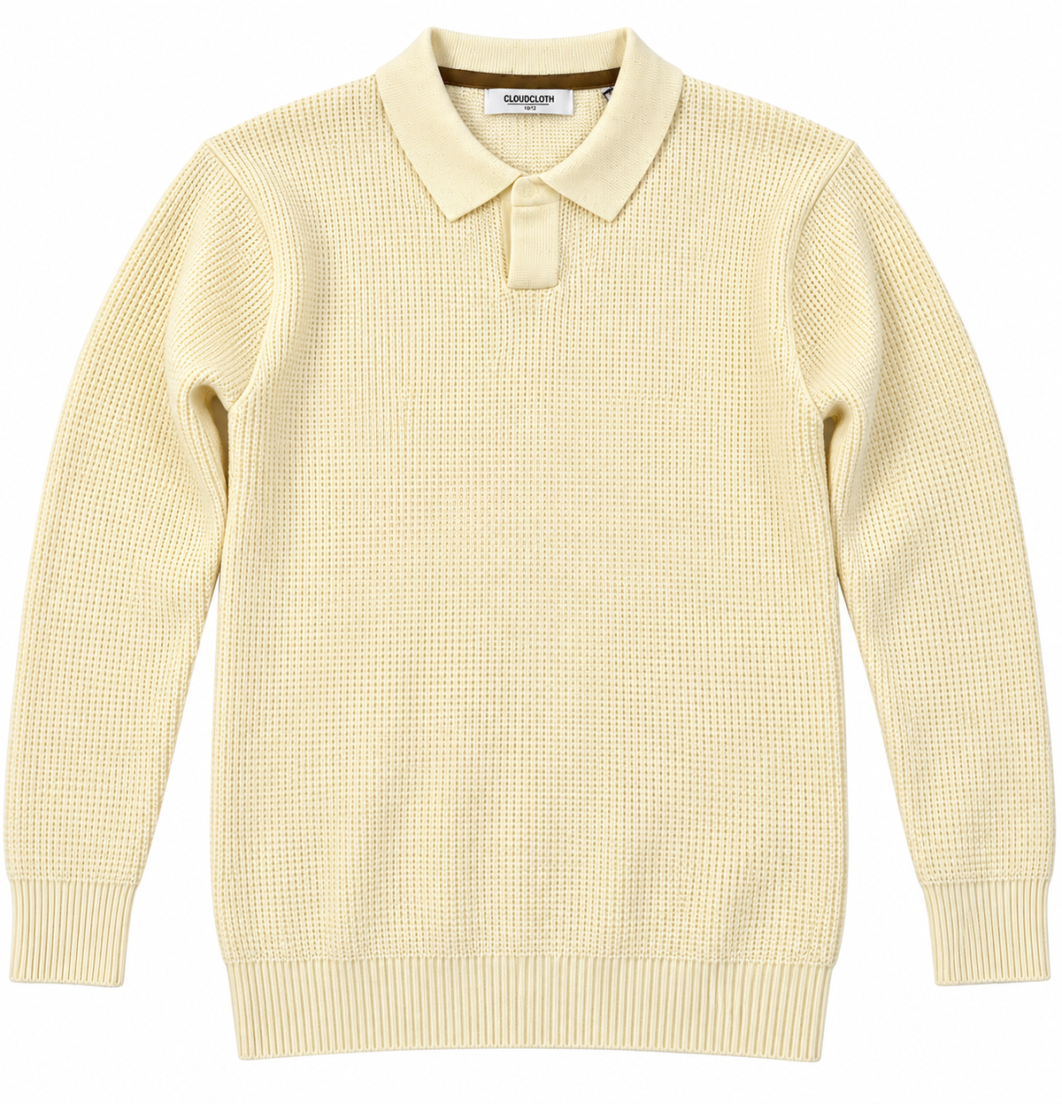 A pale yellow waffle-knit long-sleeve polo sweater with a ribbed collar, cuffs, and hem, shown flat against a white background.