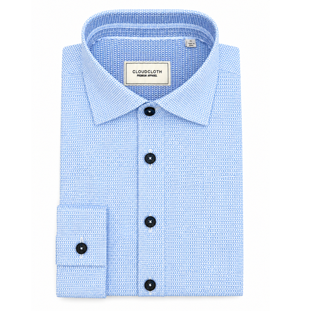 Blue patterned shirt with black buttons on a white background, featuring the CloudCloth brand.