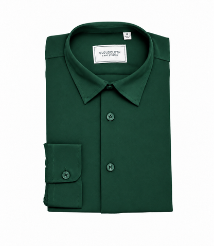 A folded dark green long-sleeve dress shirt with a pointed collar, button-down front, and a single cuff with a button, shown on a plain white background. The inner collar label reads 'CLOTHOUSE & FINISH'.