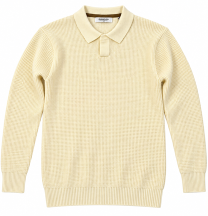 A pale yellow waffle-knit long-sleeve polo sweater with a ribbed collar, cuffs, and hem, shown flat against a white background.