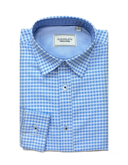 Folded blue and white checkered shirt with CloudCloth label on a white background